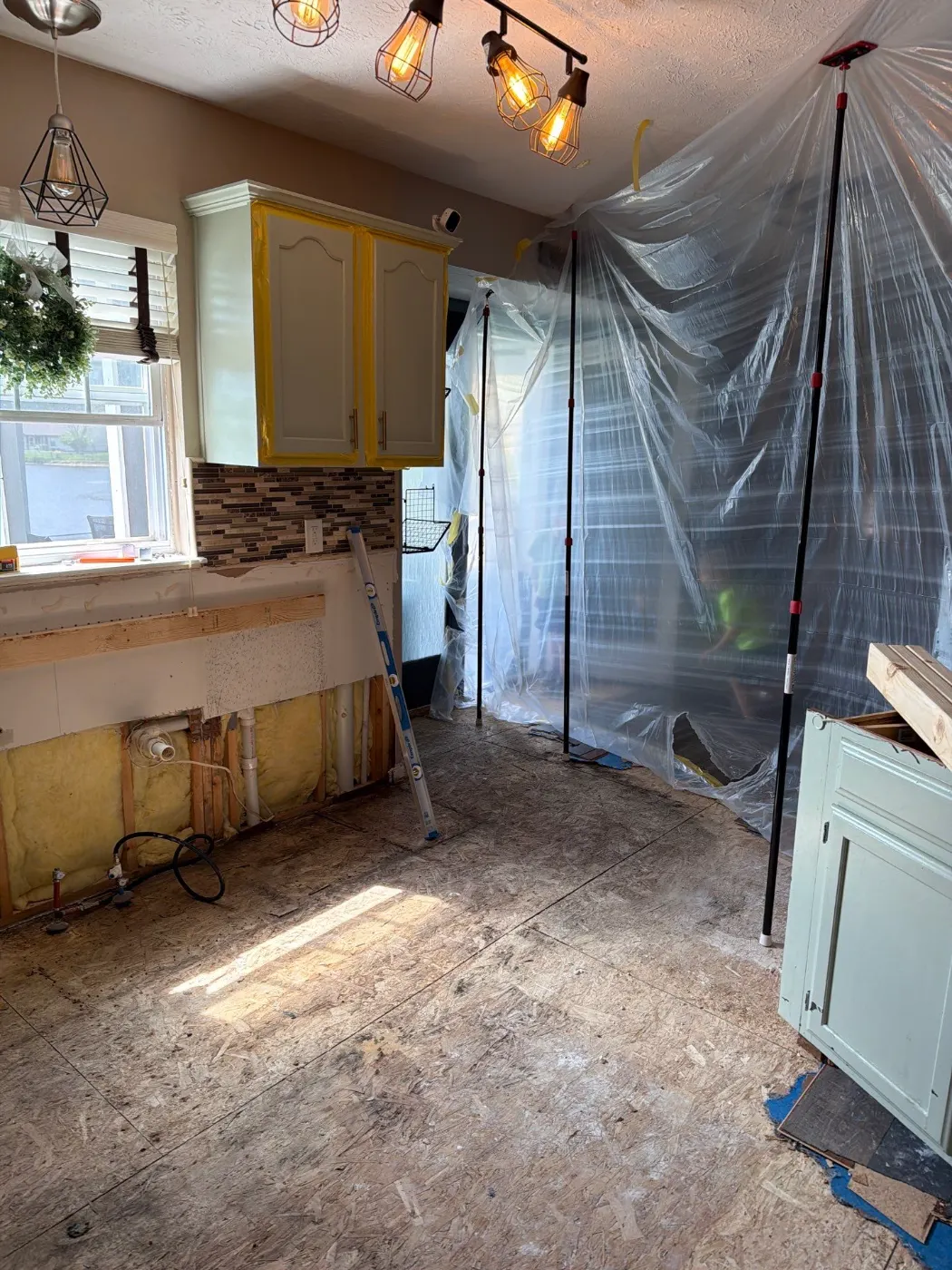 Sewage cleanup crew in PPE on-site in Viking Meadows, IN